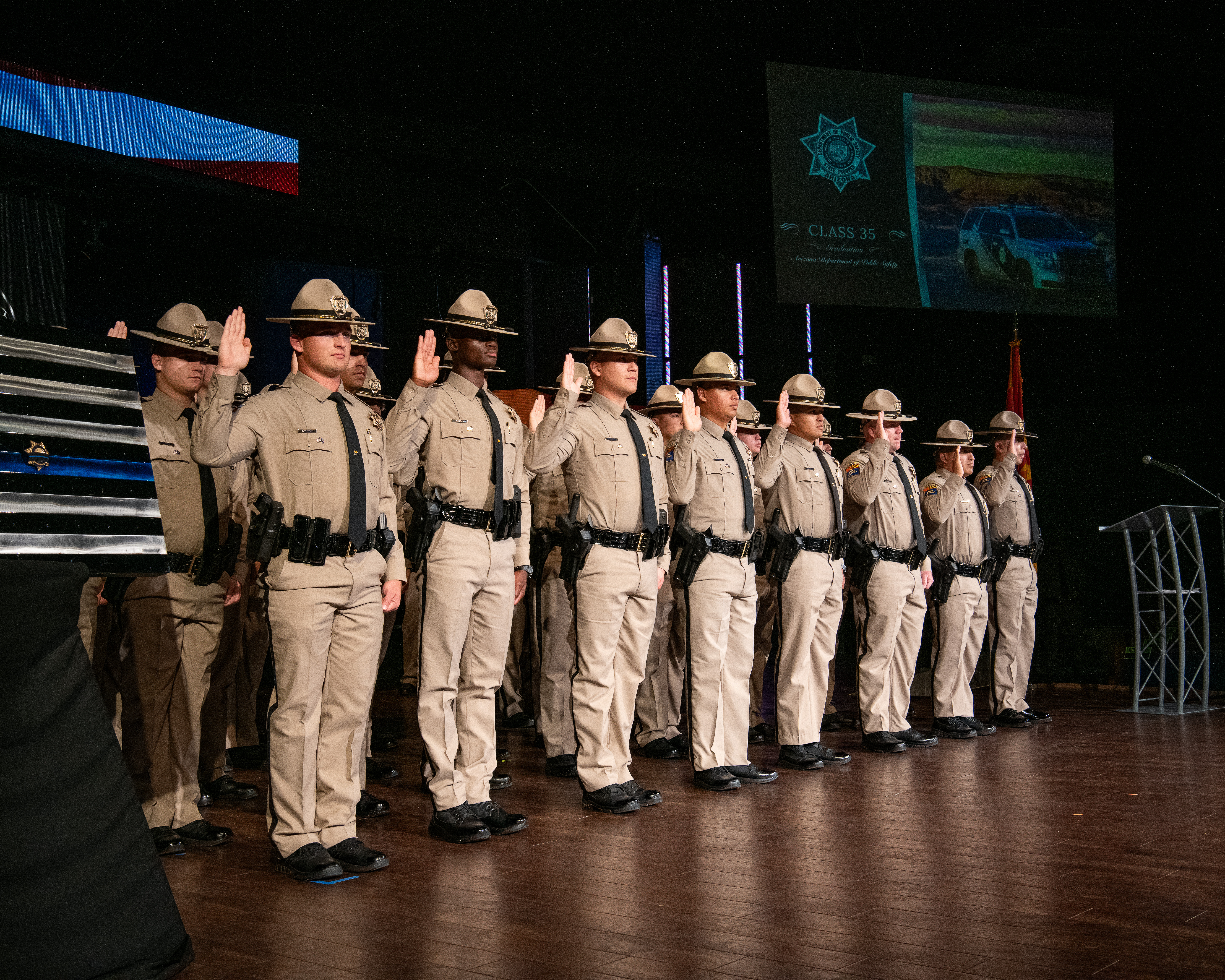 Class 35 on stage taking the peace officer oath during the graduation ceremony